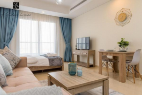 Mira Holiday Homes - Beautiful Studio - WIFI&Pool -7 min to Global Village